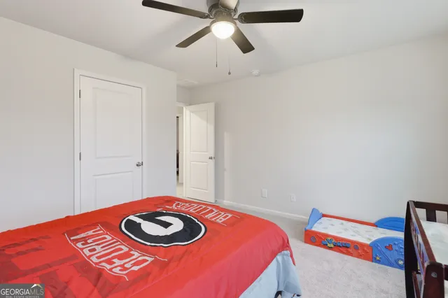 a view of a balcony with floor to ceiling windows with wooden floor