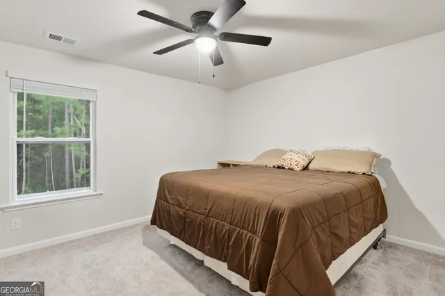 a house view with a seating space and garden view