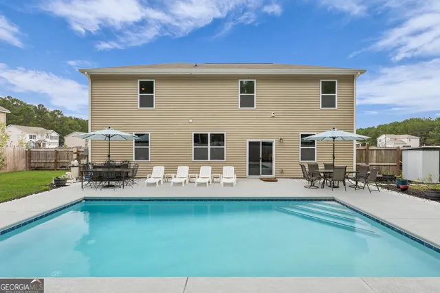a view of a backyard with a garden