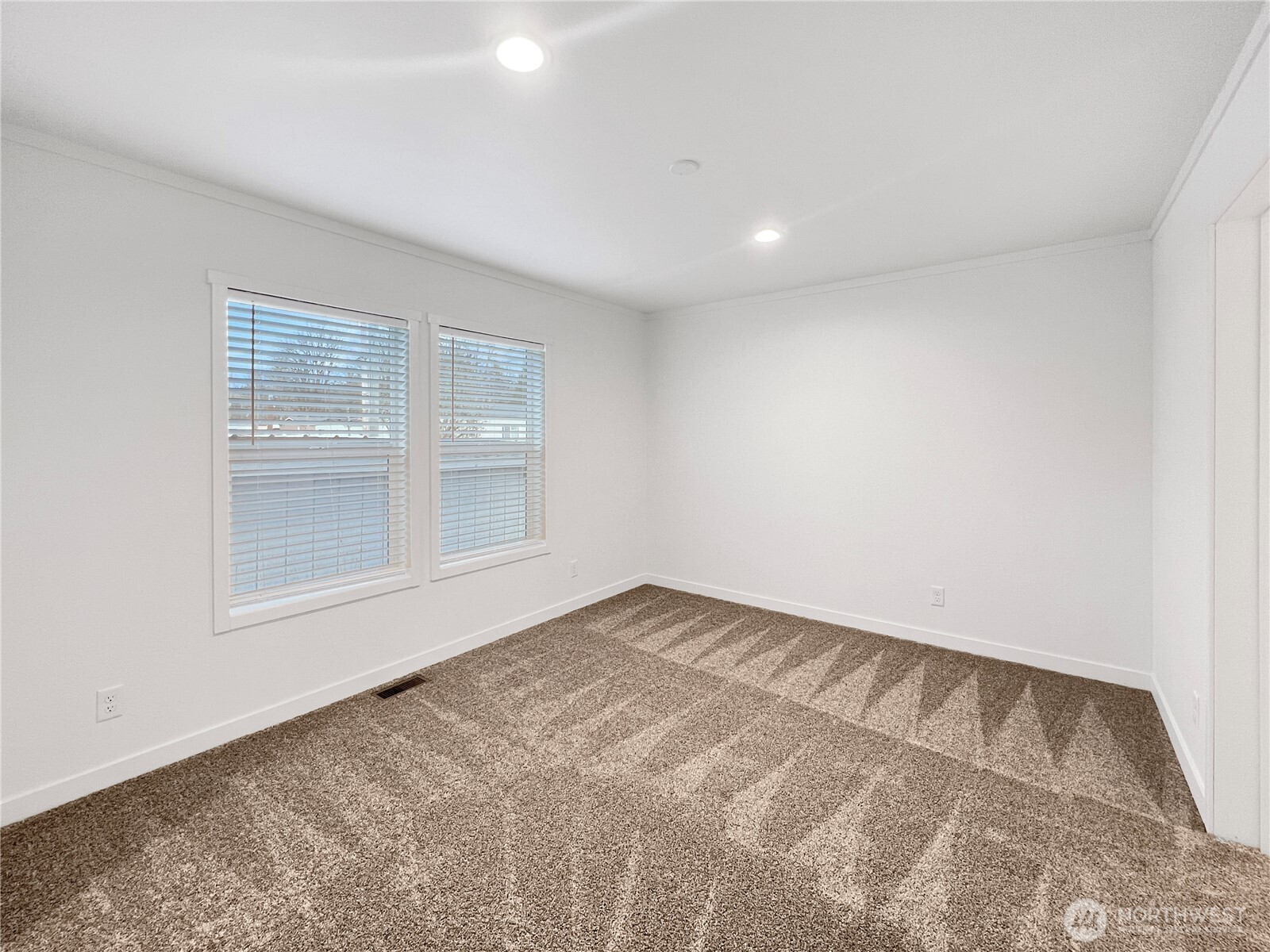 10900 Kuhlman Road Southeast, Unit 84 Olympia, WA 98513 - Photo 13 of 20 a view of an empty room with a window