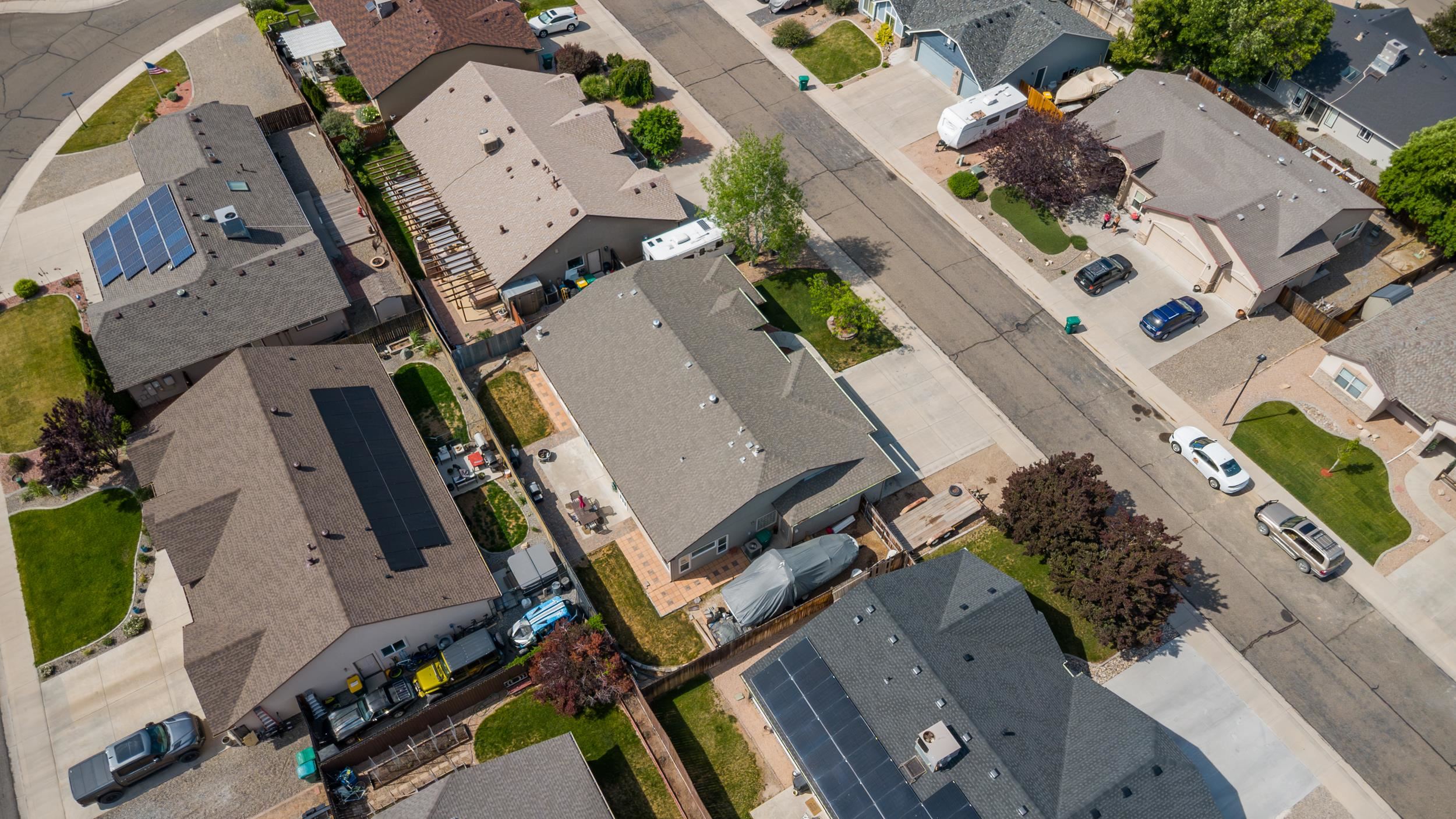 544 Hemlock Drive Fruita, CO 81521 - Photo 30 of 36 an aerial view of a city with lots of residential buildings