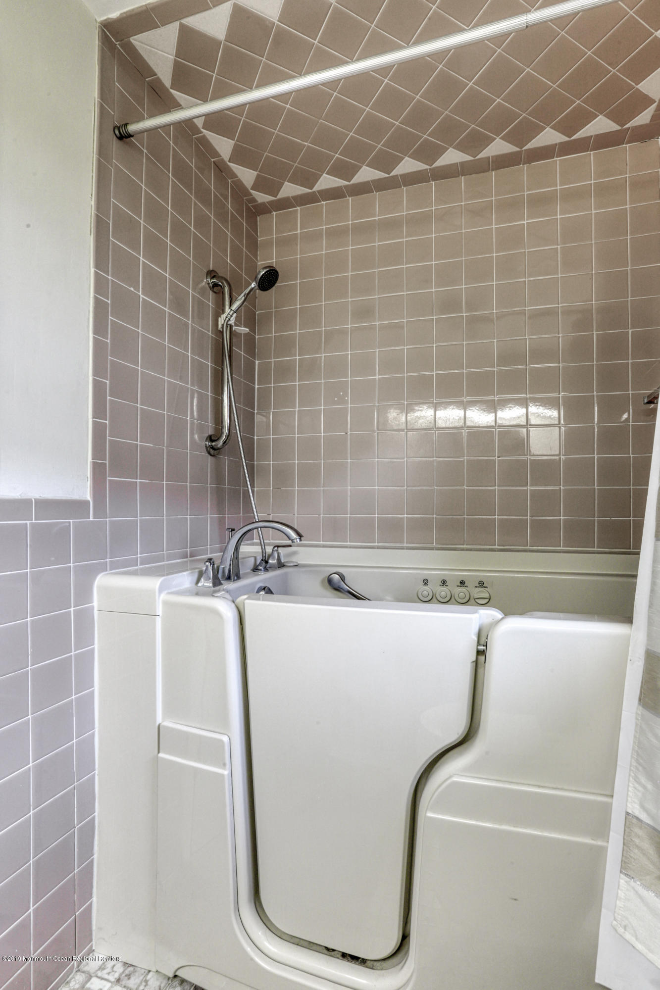 57 Whitman Street Brick, NJ 08724 - Photo 11 of 18 a bathroom with a sink a toilet and shower