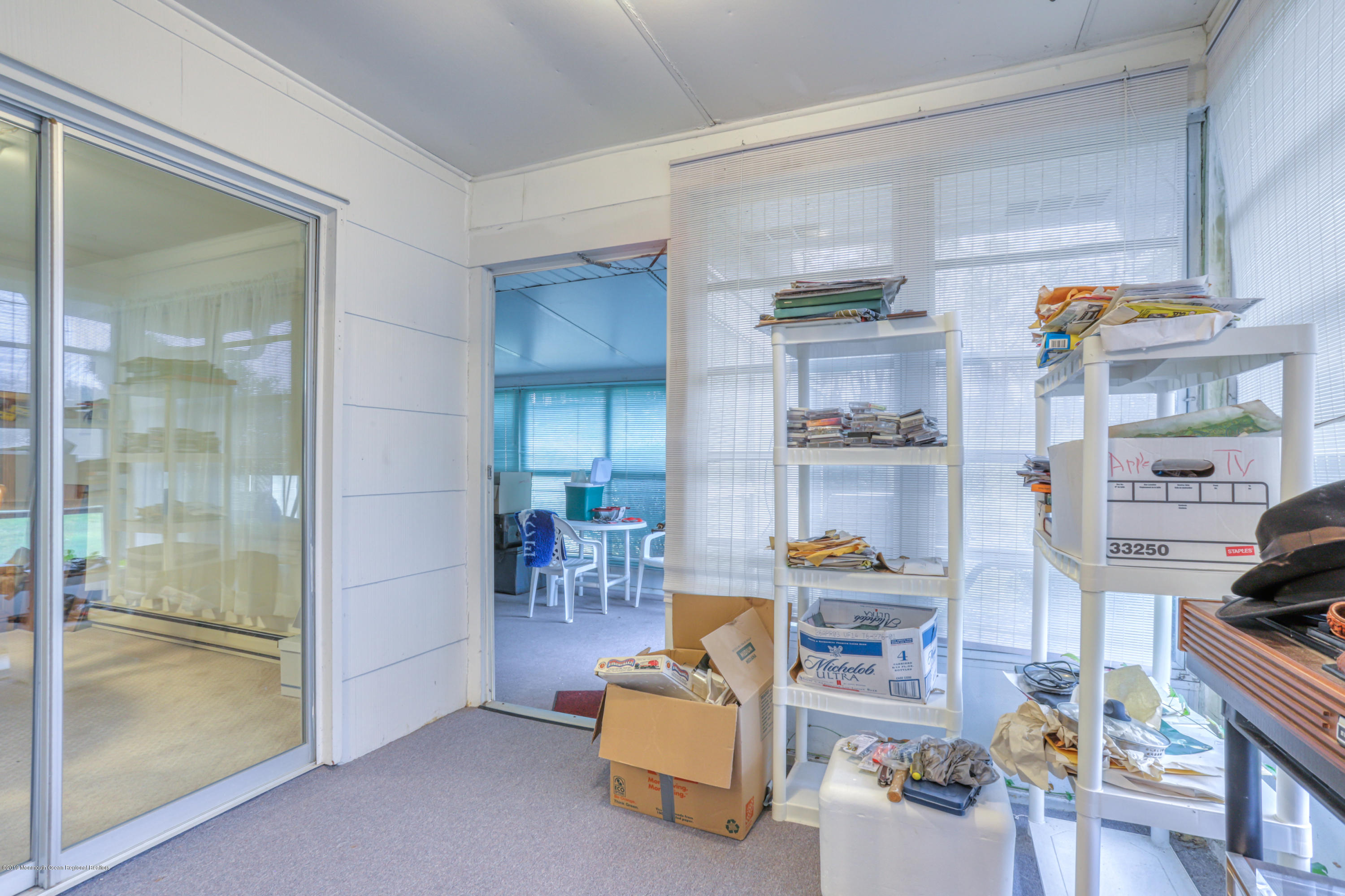 57 Whitman Street Brick, NJ 08724 - Photo 13 of 18 a living room with furniture and a kitchen view