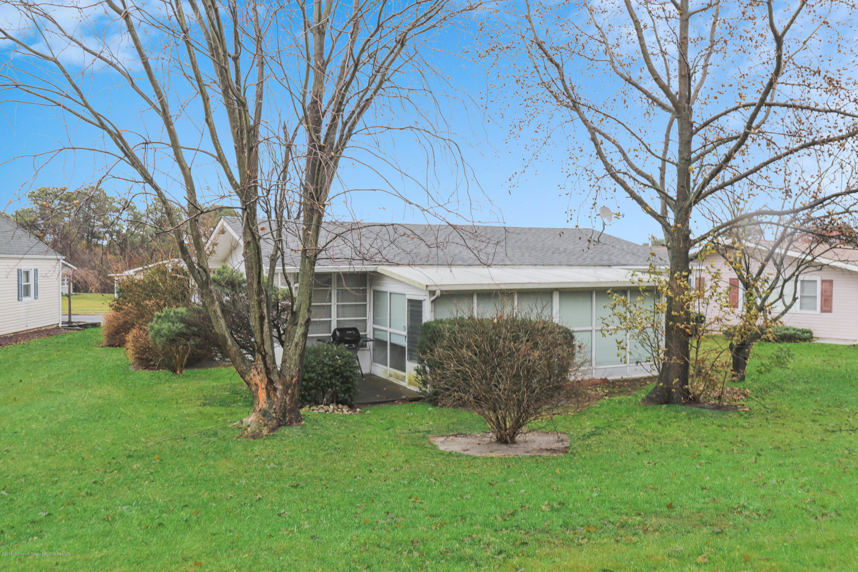 57 Whitman Street Brick, NJ 08724 - Photo 15 of 18 a front view of a house with garden