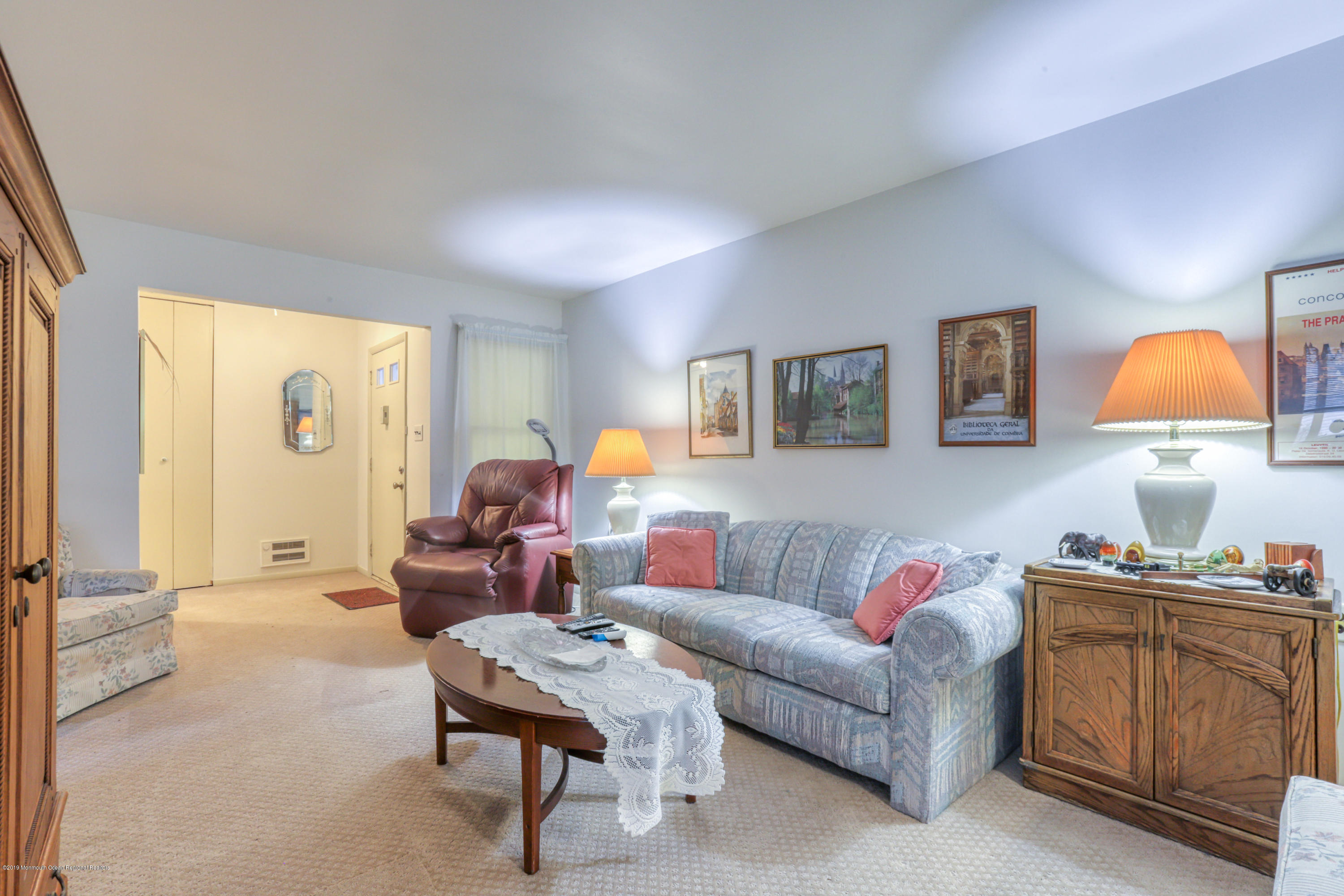 57 Whitman Street Brick, NJ 08724 - Photo 3 of 18 a living room with furniture and a lamp