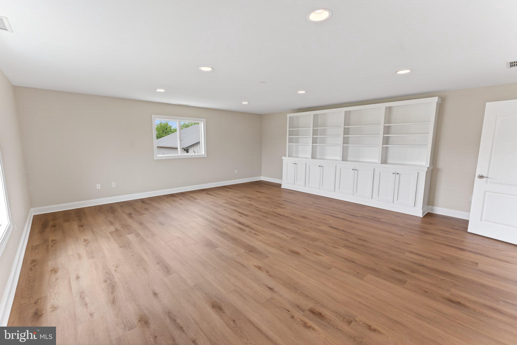 34029 Peppers Corner Road Millville, DE 19967 - Photo 77 of 101 Spacious, light-filled living area.