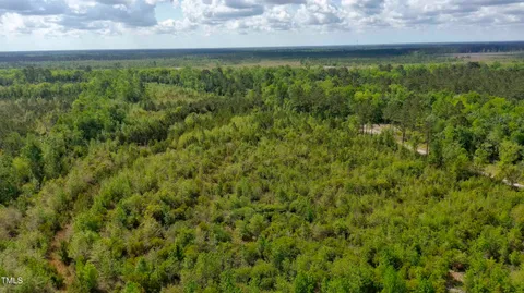 a view of a yard with an outdoor space