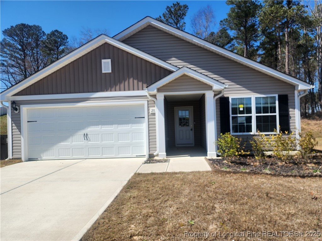 207 Barnsley Road Angier, NC 27501 - Photo 16 of 16 a front view of a house with a yard
