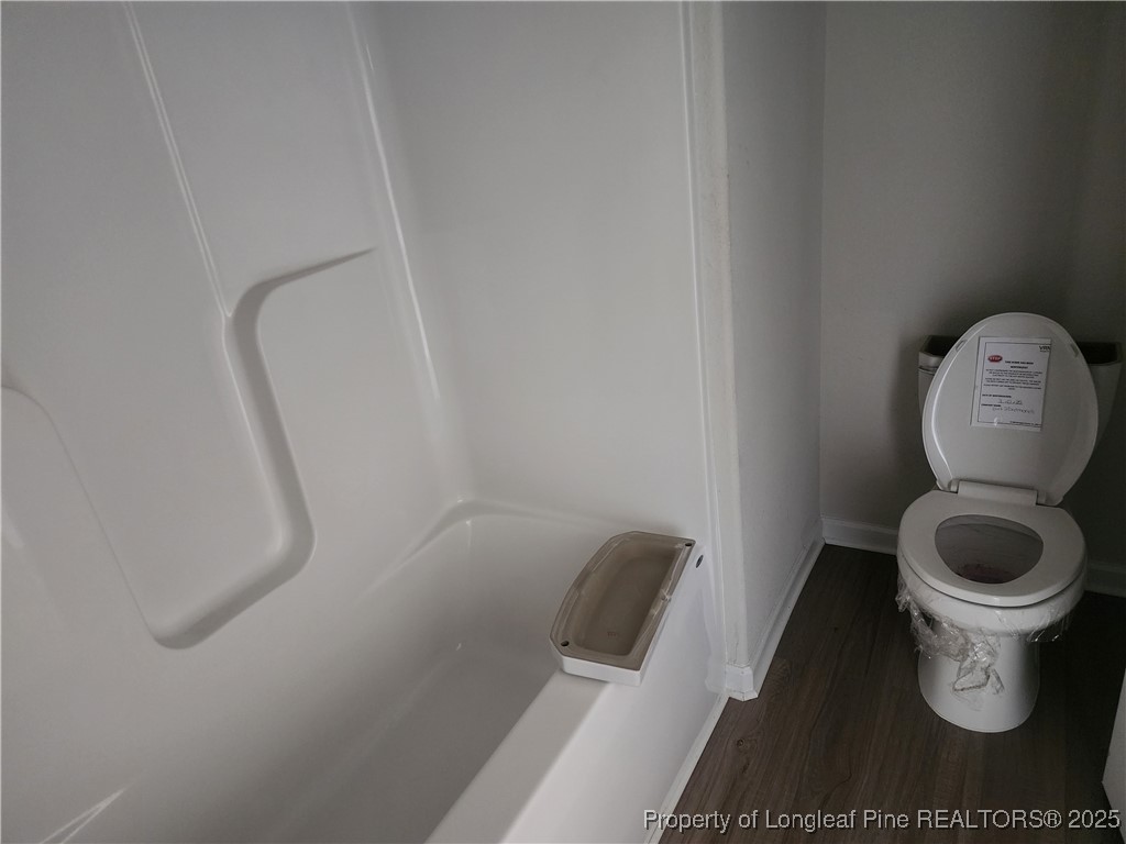 207 Barnsley Road Angier, NC 27501 - Photo 6 of 16 a close up of a toilet and a sink