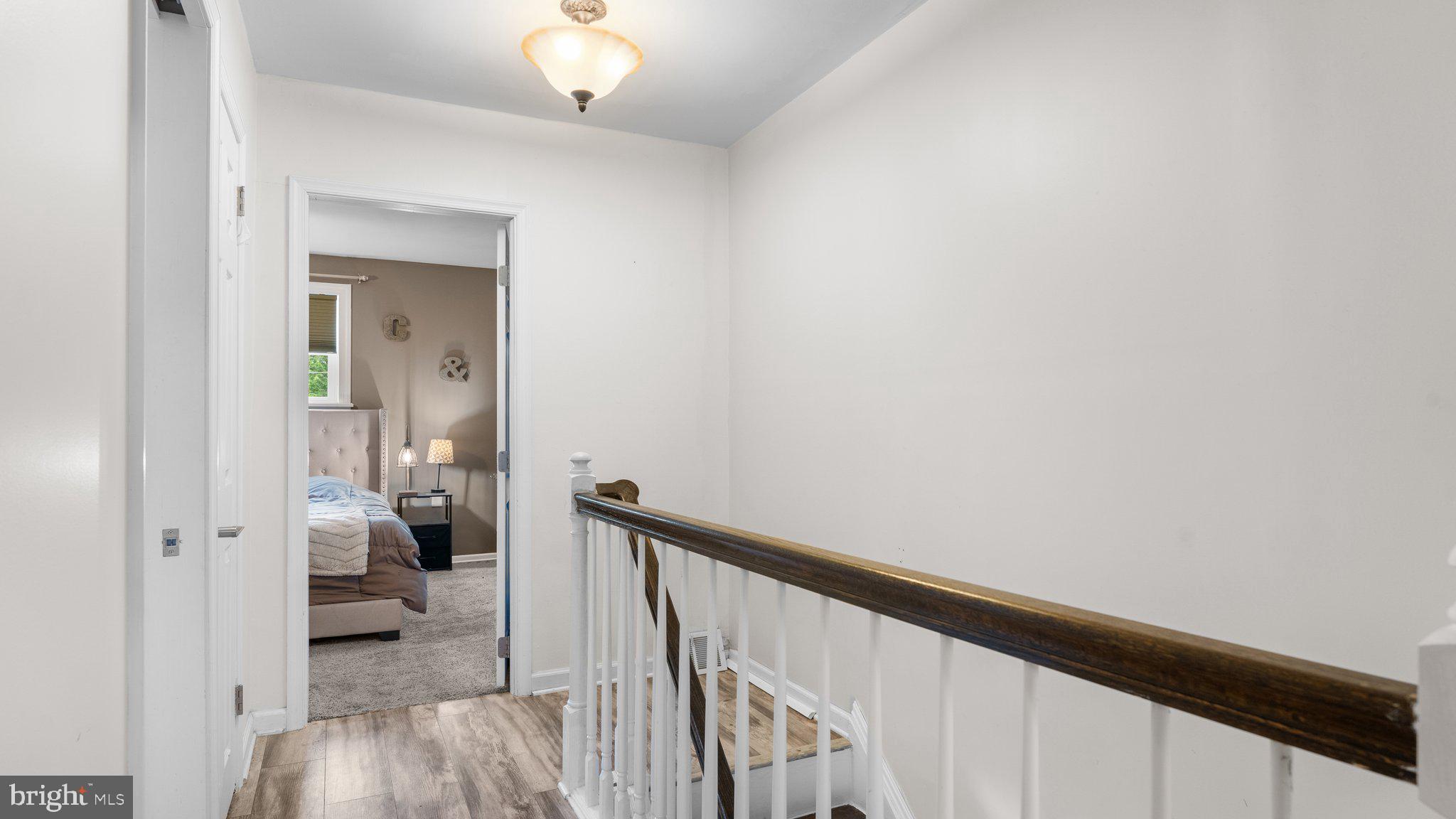 3318 Fairdale Road Philadelphia, PA 19154 - Photo 15 of 32 a view of a bedroom from a hallway
