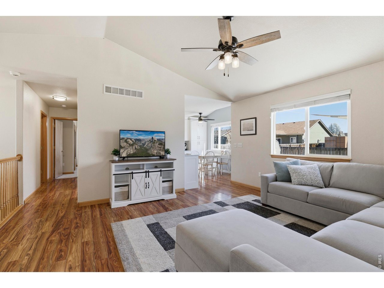 331 South Maple Avenue Eaton, CO 80615 - Photo 12 of 40 a living room with furniture and a window