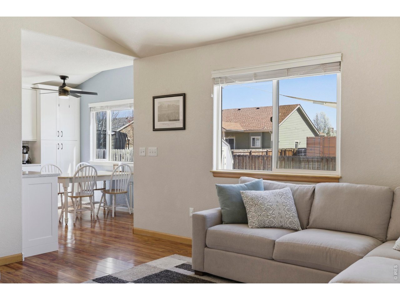 331 South Maple Avenue Eaton, CO 80615 - Photo 14 of 40 a living room with furniture and a large window