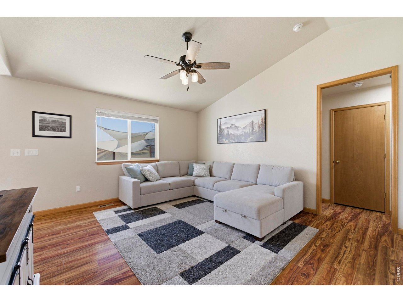 331 South Maple Avenue Eaton, CO 80615 - Photo 15 of 40 a living room with furniture and a window