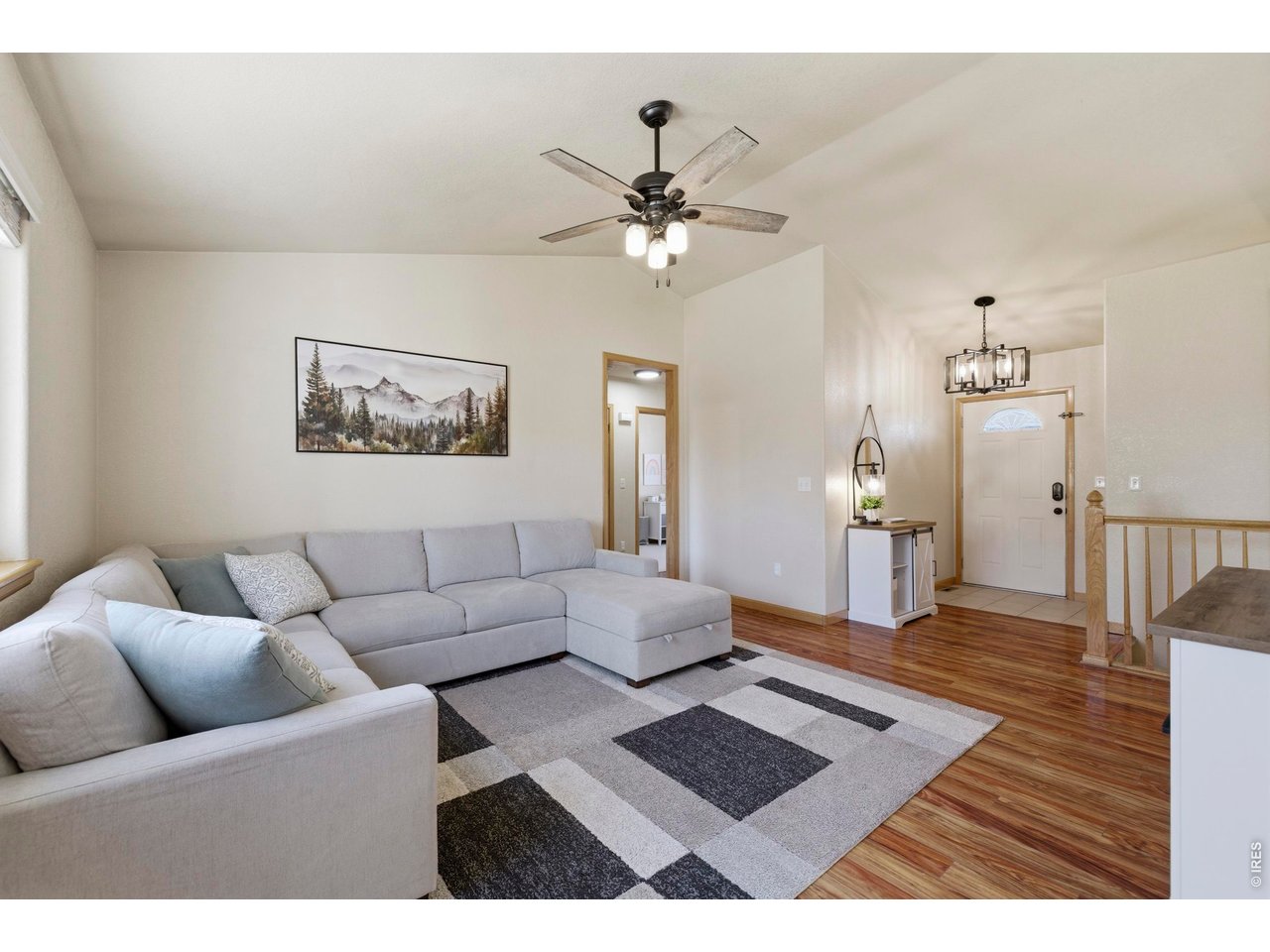 331 South Maple Avenue Eaton, CO 80615 - Photo 16 of 40 a living room with furniture and wooden floor