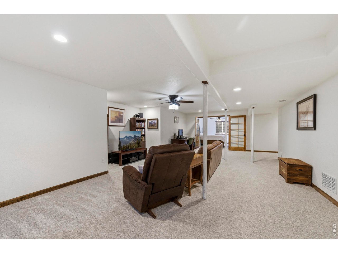 331 South Maple Avenue Eaton, CO 80615 - Photo 25 of 40 a living room with furniture and a flat screen tv
