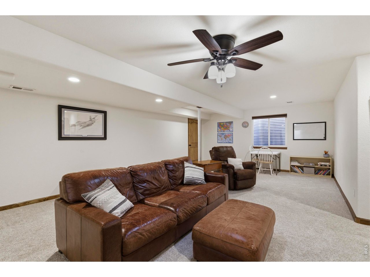 331 South Maple Avenue Eaton, CO 80615 - Photo 26 of 40 a living room with furniture and a ceiling fan