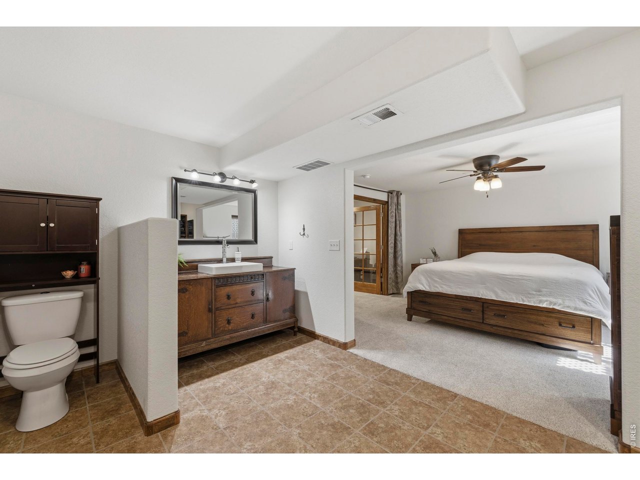 331 South Maple Avenue Eaton, CO 80615 - Photo 33 of 40 a bedroom with a bed and a view of bathroom