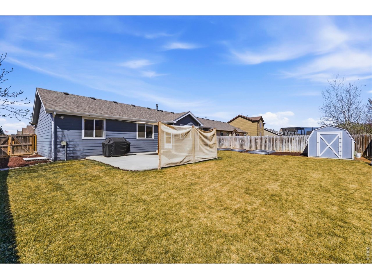 331 South Maple Avenue Eaton, CO 80615 - Photo 40 of 40 a view of a house with a swimming pool