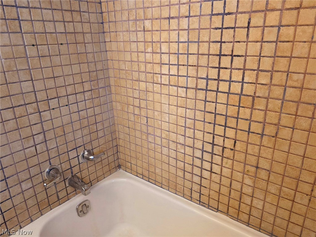 4111 Redfern Road Parma, OH 44134 - Photo 17 of 40 First floor bathroom with shower/tub combo