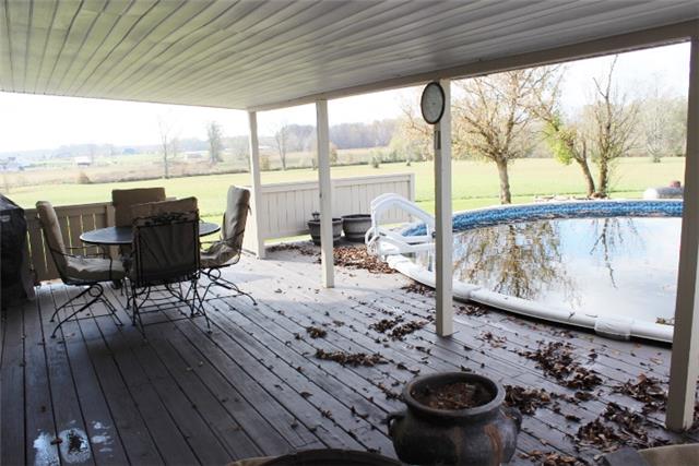 7239 Maple Springs Road Manchester, TN 37355 - Photo 19 of 20 COVERED DECK WITH ABOVE GROUND POOL.