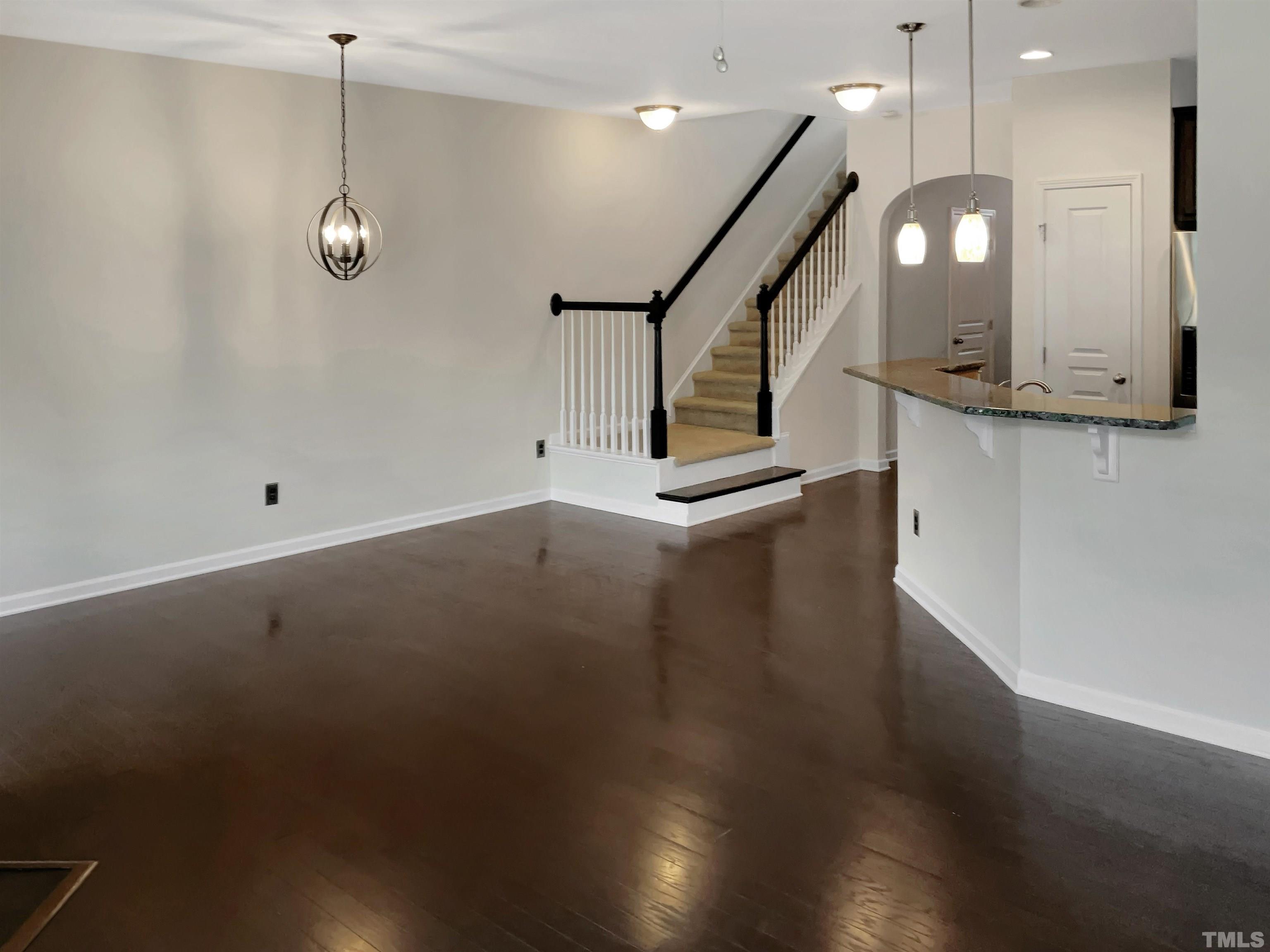 7249 Terregles Drive Raleigh, NC 27617 - Photo 3 of 36 a view of an entryway with wooden floor