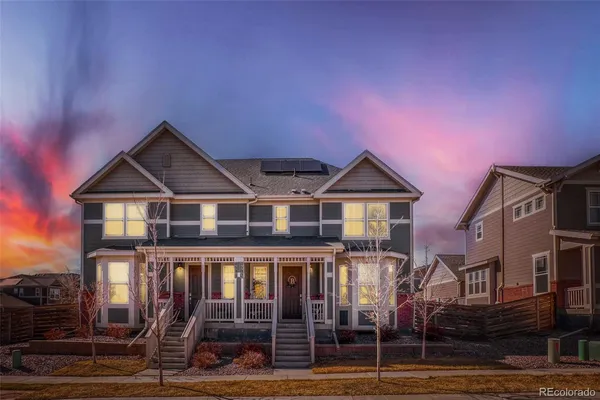a front view of a house with yard