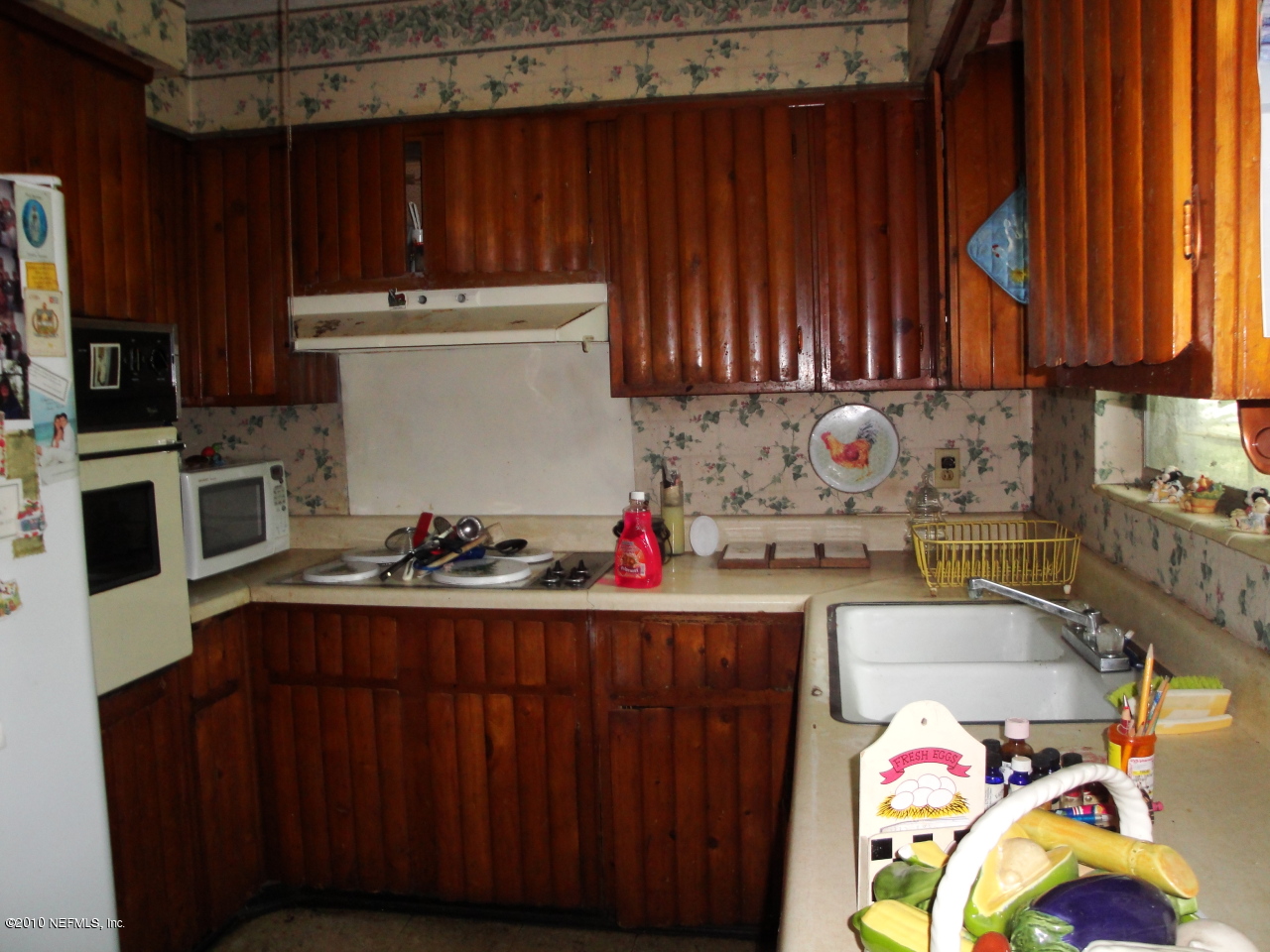 5541 Beney Road Jacksonville, FL 32207 - Photo 5 of 15 a room with storage and utility