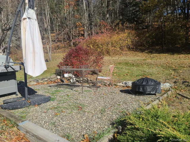 a view of swimming pool with a yard