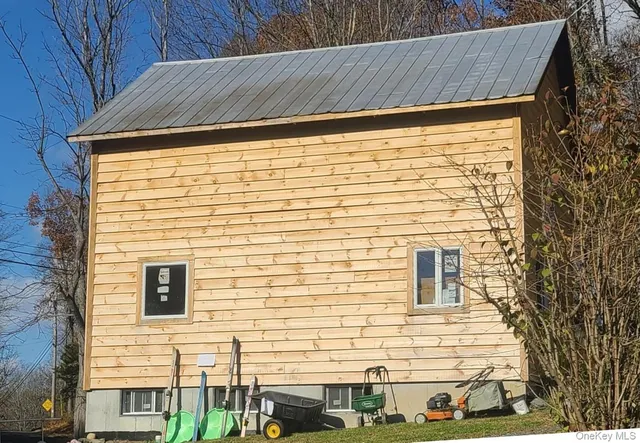 a view of a brick house with a window