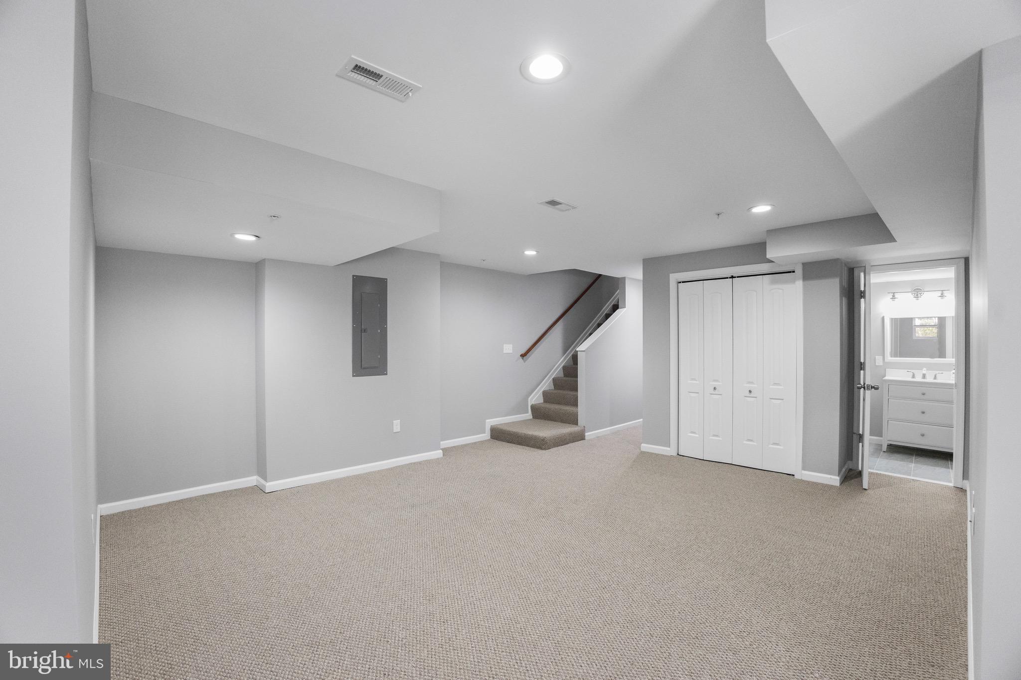 2917 13th Street Northwest Washington, DC 20009 - Photo 18 of 33 an empty room with a ceiling fan and entryway