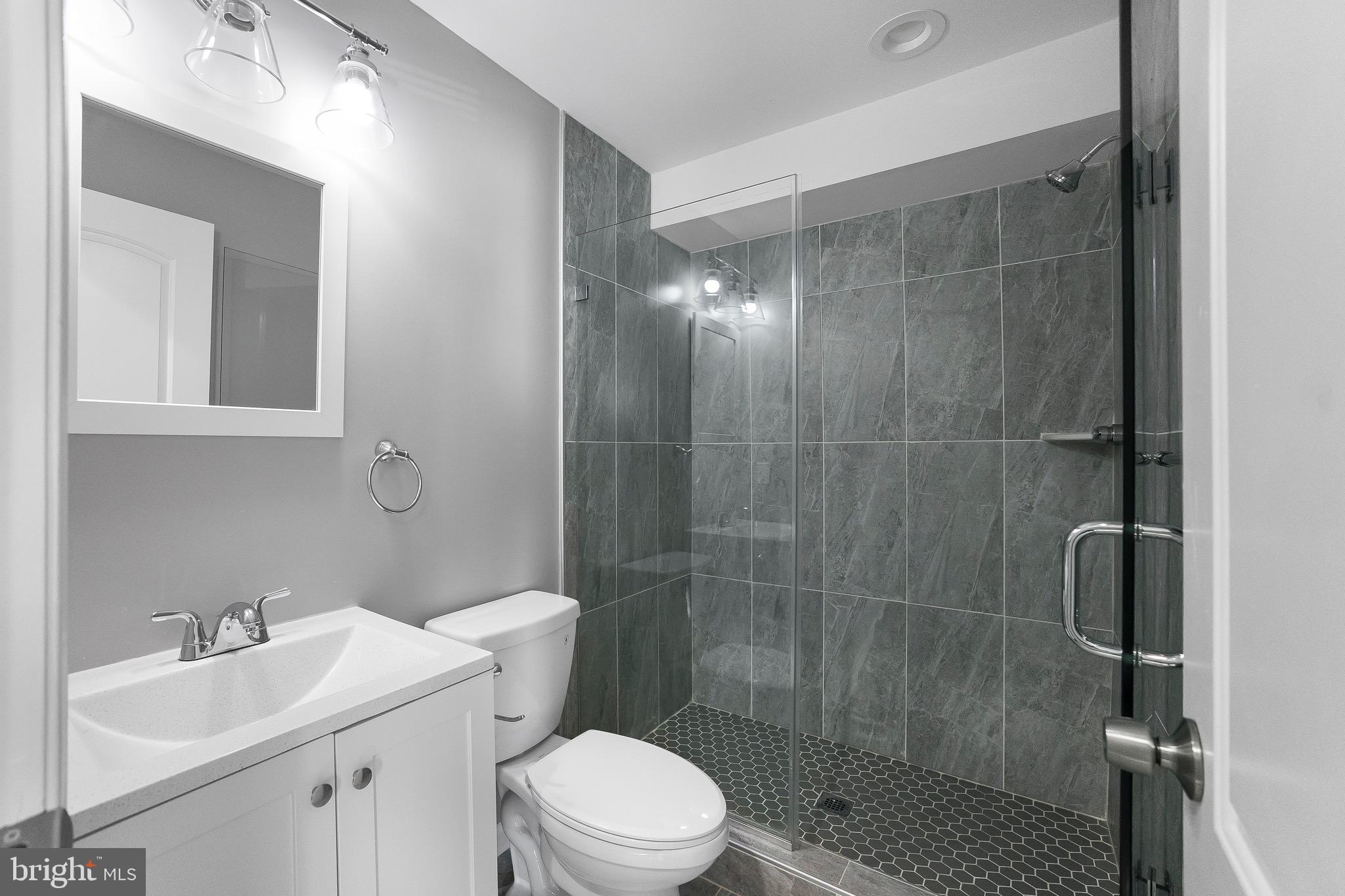 2917 13th Street Northwest Washington, DC 20009 - Photo 22 of 33 a bathroom with a sink toilet and shower
