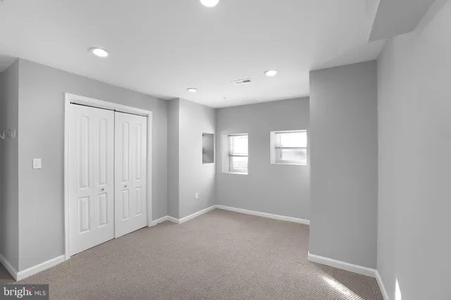 a picture of a bathroom with a shower