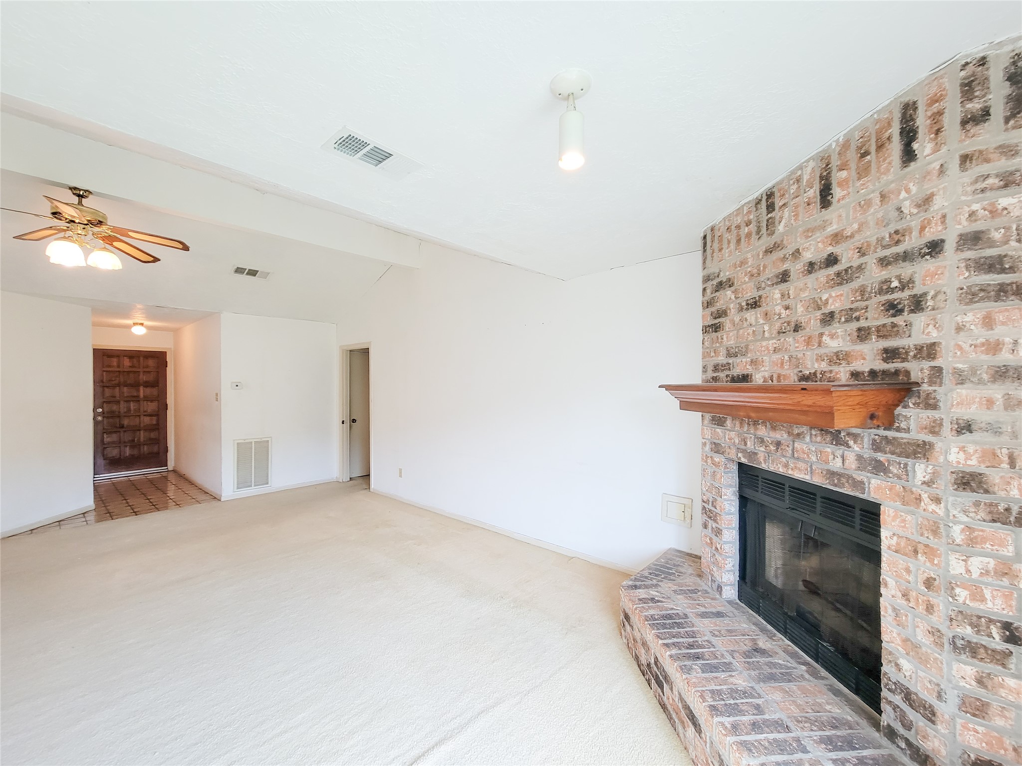 23211 Timberbrook Drive Spring, TX 77373 - Photo 8 of 34 a view of a livingroom with a fireplace