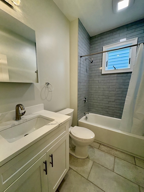 54 Falcon Street, Unit 54 Boston, MA 02128 - Photo 7 of 19 a bathroom with a sink toilet and shower