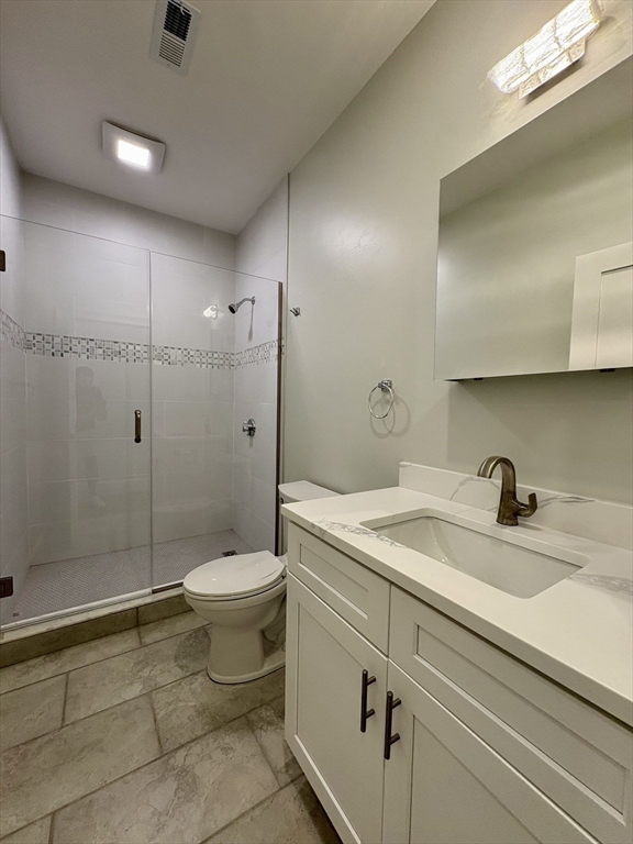 54 Falcon Street, Unit 54 Boston, MA 02128 - Photo 10 of 19 a bathroom with a sink toilet and shower