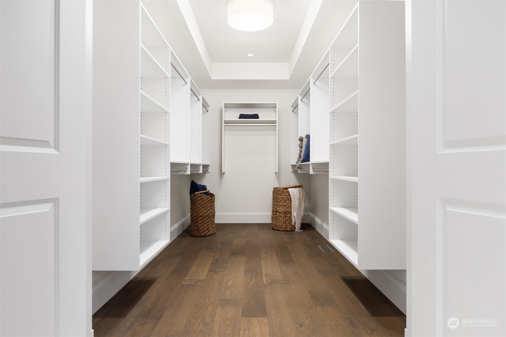 627 Linden Road Bellingham, WA 98225 - Photo 23 of 40 a view of a hallway with wooden floor and windows
