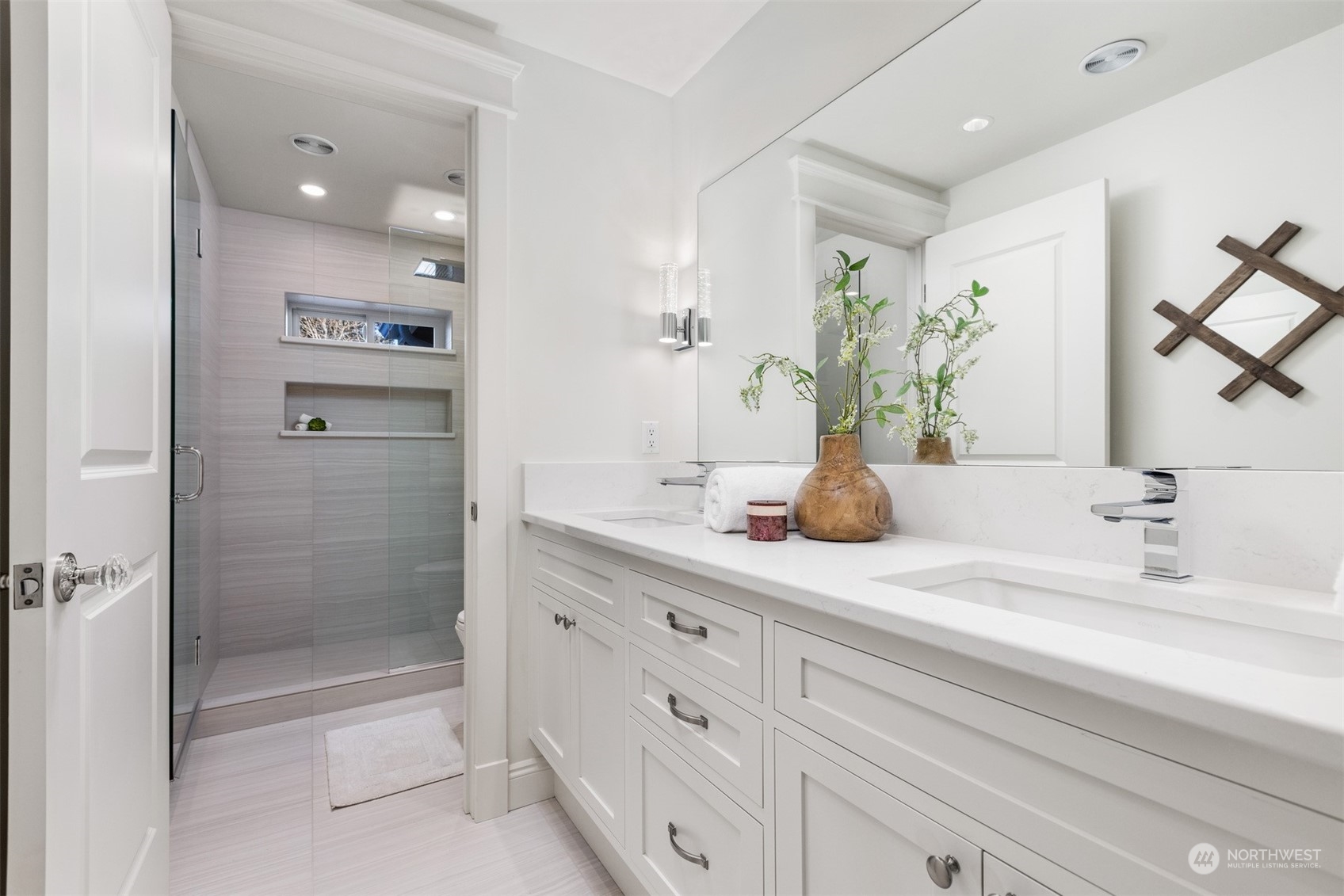 627 Linden Road Bellingham, WA 98225 - Photo 27 of 40 a bathroom with a double vanity sink mirror and shower