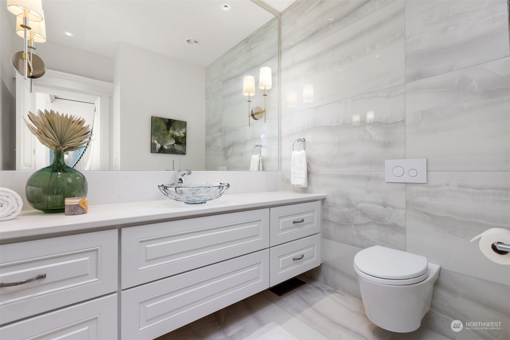627 Linden Road Bellingham, WA 98225 - Photo 10 of 40 a bathroom with a granite countertop toilet sink and mirror