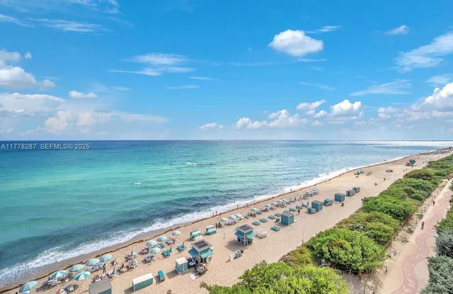 a view of an ocean from a balcony