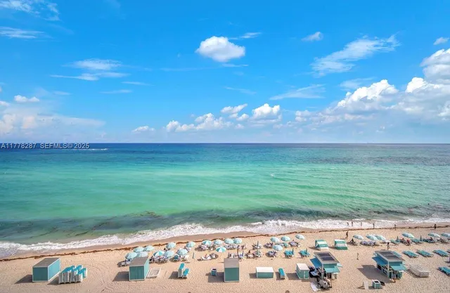 a view of a golf course with a lake