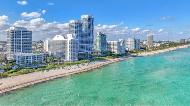 a view of a city with tall buildings