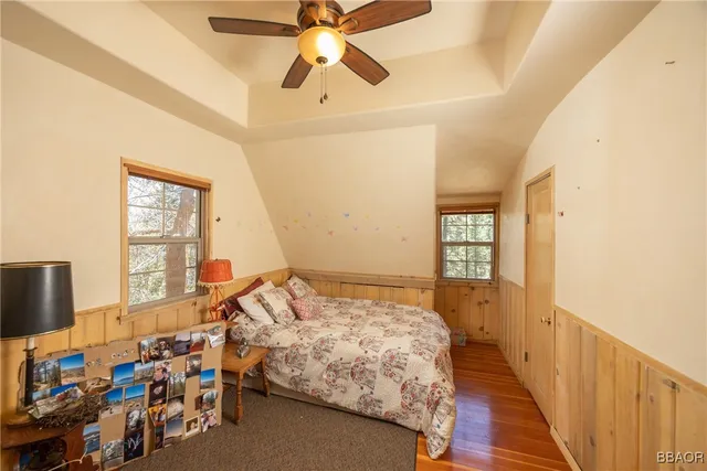 a view of a livingroom with furniture and a window