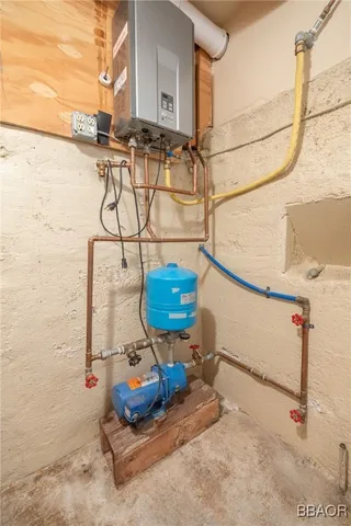 a view of a house with wooden fence