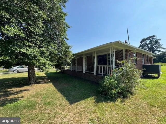 a view of a house with a garden