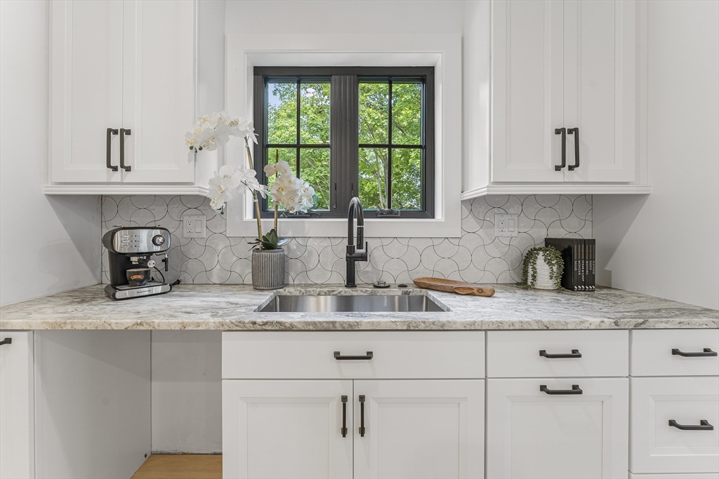12 Guild Road, Unit 12 Needham, MA 02494 - Photo 11 of 32 a kitchen with sink and window