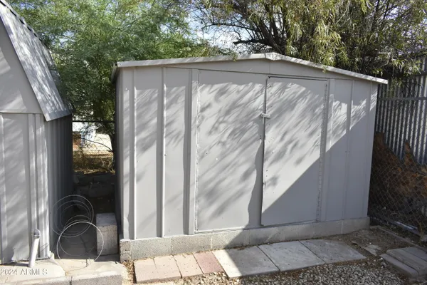 a view of a backyard with plants