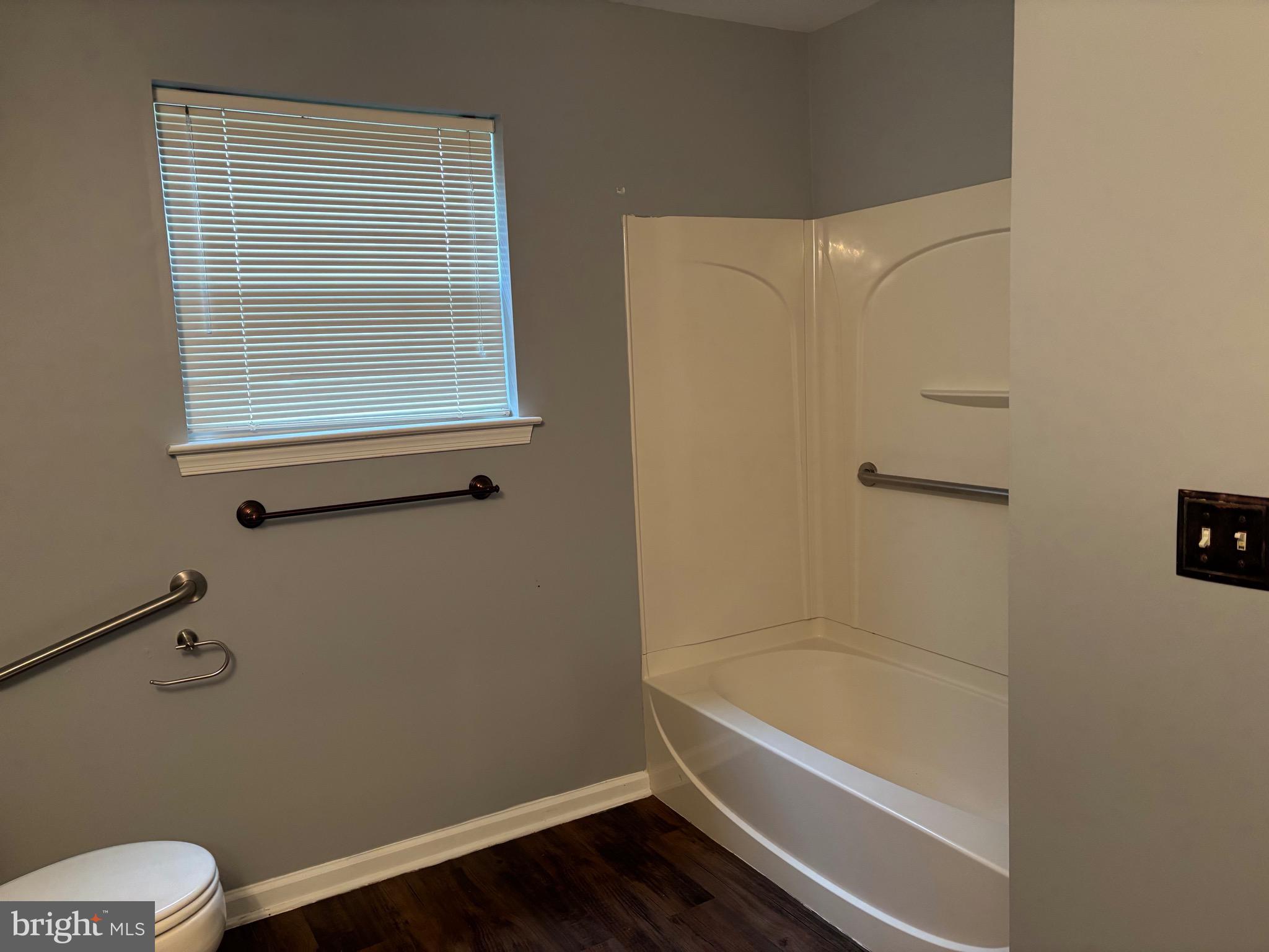 127 Natalie Road Riverside, NJ 08075 - Photo 15 of 18 a bathroom with a granite countertop bathtub shower and toilet