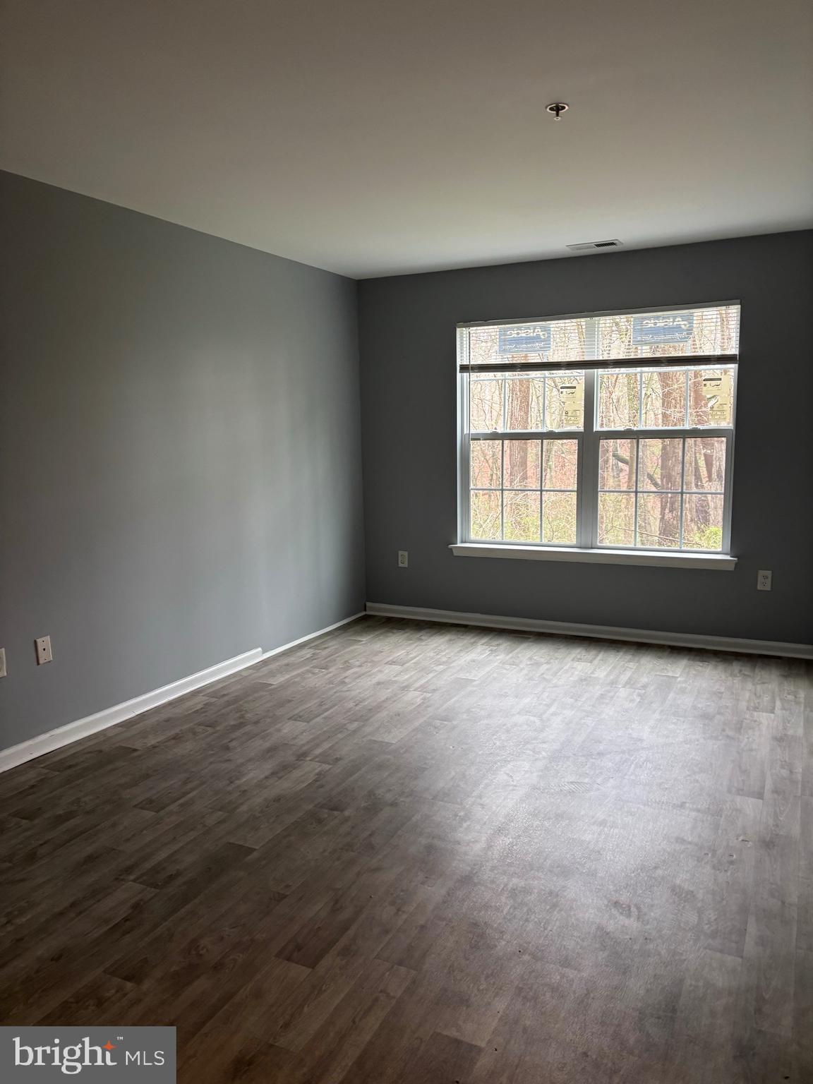 127 Natalie Road Riverside, NJ 08075 - Photo 10 of 18 an empty room with a empty space and windows