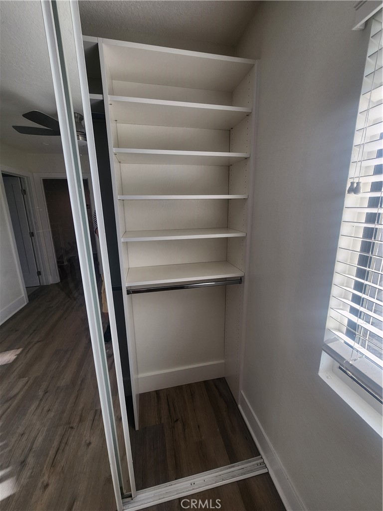 418 Avenida Santa Barbara, Unit B San Clemente, CA 92672 - Photo 28 of 52 a view of a closet with wooden floor