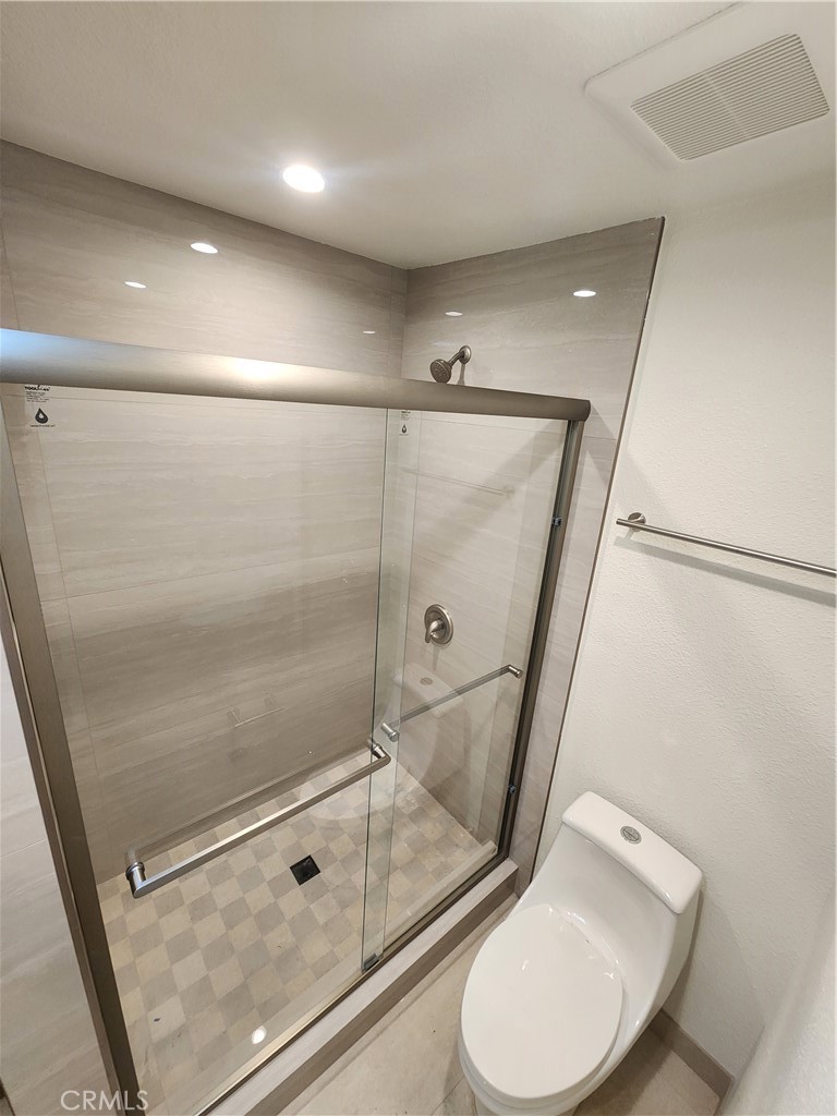 418 Avenida Santa Barbara, Unit B San Clemente, CA 92672 - Photo 34 of 52 a bathroom with a toilet and a shower